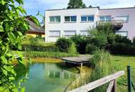 Exquisites Wohnen mit großzügiger Sonnen-Terrasse und Schwimmbiotop