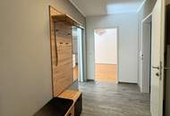 Modernes Wohnhighlight im Grünen: 3-Zimmer mit Garten-Balkon und 2 Garagenplätzen