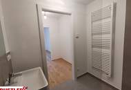 Hofseitig ausgerichtete 2-Zimmer-Wohnung mit großem Balkon und Hochbeet