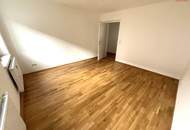 Moderner Rückzugsort für Familien & Naturfans: helle Wohnküche, 3 Schlafzimmer und ein hochwertiges Bad vereinen Komfort, Stil und urbanes Lebensgefühl auf kompaktem Raum!