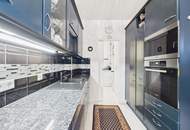 Wohntraum der Extraklasse: Exklusives Penthouse auf 2 Etagen mit großer Terrasse und schönem Garten in begehrter Lage