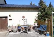 3-Zimmer-Bungalow auf 870 m² Grund mit neuem Dach und Pelletszentralheizung