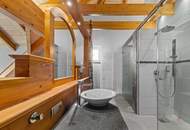 Wohngenuss im Dachgeschoss – Seeblick, Wellnessoase & alpiner Charme vereint