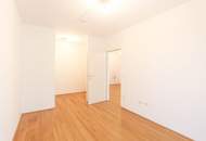Sonnige Wohnung mit Blick ins Grüne, Balkon und Garage!