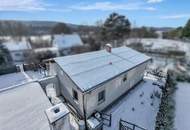 "Ankommen am Promenadenweg: Bungalow im Grünen – nahe Wien mit Potential"