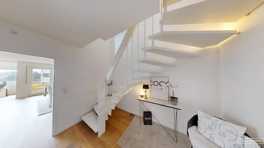 Moderne Dachgeschoss-Maisonette in Wien-Mauer mit zwei Balkonen, Garage und Liftzugang auf beiden Ebenen | ZELLMANN IMMOBILIEN