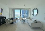 2-Zimmer-Panoramawohnung im 48. Stock mit Abendsonne und Weitblick bis Kahlenberg und Leopoldsberg