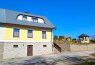 Haus mit Seeblick in grüner Ruhelage