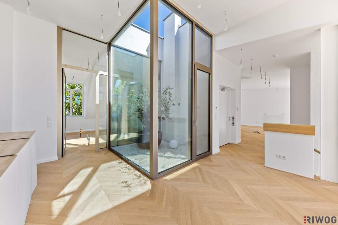 3,7m Raumhöhe im DG, Garage mit 2 Stellplätze, Atrium, Aufzug in die Wohnung und 360° Dachterrasse