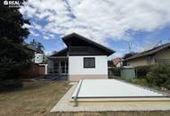 Wohnen am Waldrand - gepflegtes Einfamilienhaus mit Pool, Garage und Keller