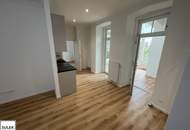 Alles NEU! Erstbezug nach Sanierung: Charmante Drei-Zimmer Gartenwohnung mit Wohn- Wintergarten in grüner Lage bei Ober St. Veit