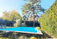 Einfamilienhaus mit großem Grundstück, 2 Eingängen, Grenze zu Wien