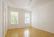 Das Stadtleben in Ruhe genießen: Stil-Altbauwohnung in lebendiger Lage an der Grenze 7./8. Bezirk