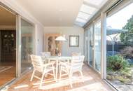 Ruhelage: Gepflegter Bungalow mit Wintergarten