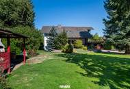 Großzügiges Haus mit sonnigem Garten, Carport, Garage und Fußbodenheizung!