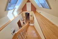 Außergewöhnliche Haushälfte vor den Toren Wiens mit enormem Potential