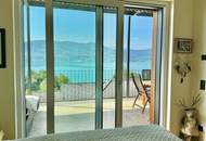 Privates Wörthersee-Panorama auf höchstem Niveau – Penthouse in der Villa Onda mit Sauna & 2xTG