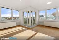 Lichtdurchflutete Dachgeschosswohnung mit traumhaftem Weitblick