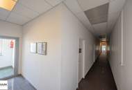 Grundstück mit vier Baukörpern - Büro-, Geschäfts- und Gewerbegebäude inkl. Parkplätzen in Vösendorf