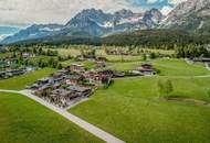 Baugrundstück mit atemberaubendem Kaiserblick in Going