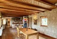 "Charmantes Einfamilienhaus mit Terrasse, Garage und zusätzlichem Grundstück"