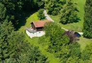 Zum Verkauf steht ein zusammenhängendes Landwirtschafts- und Waldgrundstück mit Holzhaus