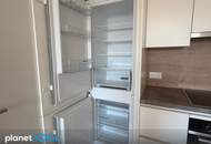 Topwohnung mit großem Balkon – neuwertig, stilvoll, mit Garage – Raumwunder