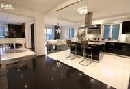 Luxuriöses Wohnen: Designhaus mit Garten, Pool und geräumiger Garage