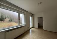 Großzügige Eigentumswohnung mit Balkon, Wintergarten, Gartenanteil und Garagenparkplatz in St. Gertraud