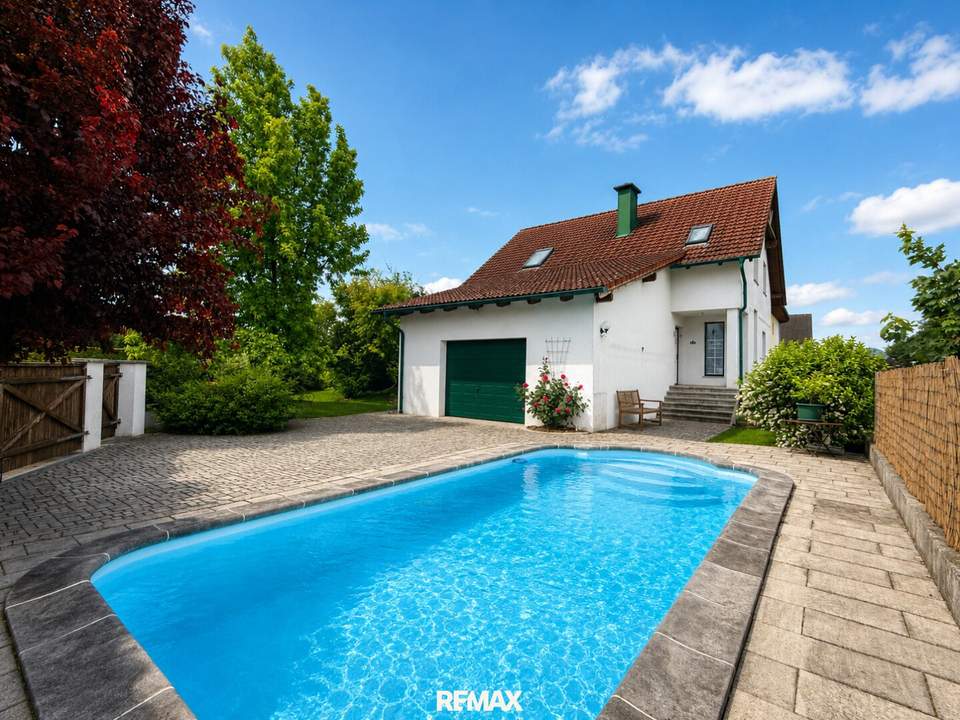 *** Ein Wohntraum mit Urlaubsgefühl: Traumhaft gepflegtes Einfamilienhaus mit Pool, Gartenidylle, Specksteinofen, Wasser-Wasserwärmepumpe mit Fußbodenheizung in Top-Lage ***