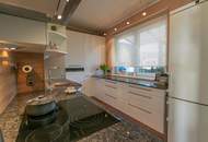 ***Wohlfühl-2-Zimmerwohnung mit großer Dachterrasse und Wintergarten***