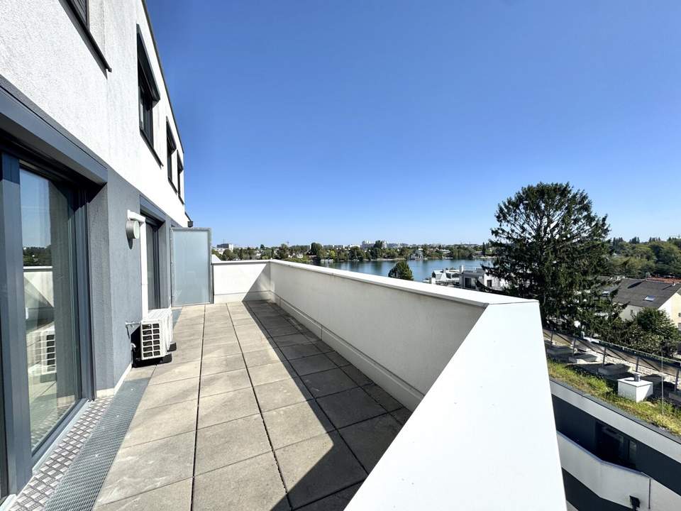Penthouse mit Donaublick und 360 Grad Dachterrasse - direkt an der Alten Dona