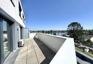 Penthouse mit Donaublick und 360 Grad Dachterrasse - direkt an der Alten Dona