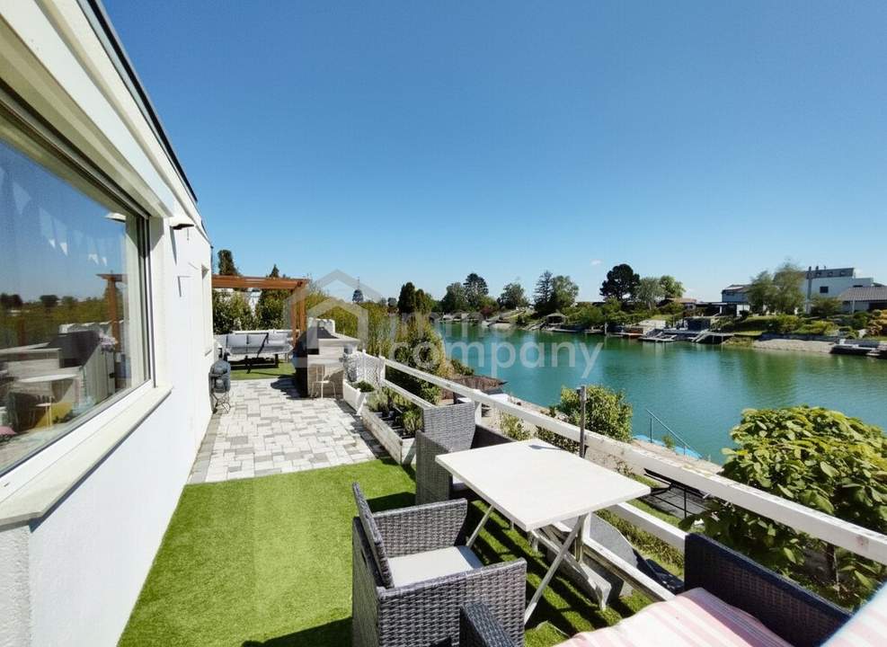 Seeliegenschaft leistbar gemacht: Haus am Wasser mit Traumterrasse &amp; eigenem Steg