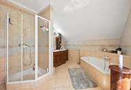 High-end living in a peaceful green location! A feel-good retreat in a class of its own: tradition meets state-of-the-art comfort!