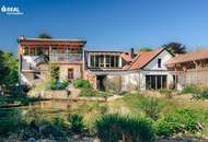 Schlichtes "Amerikanerhaus" mit prachtvollem Naturgarten, Schwimmteich und mit 2 separaten Wohneinheiten !
