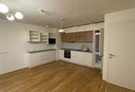 Wohnen im Bel Atrium: Zwei Zimmer Neubau Wohnung mit Balkon, inkl. Stellplatz und vielen Extras