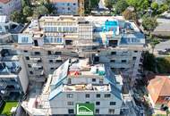 Über den Wolken .... Top-aufgeteilte DG-Wohnung mit Fernblick und riesiger Terrasse in Bestlage (Donauzentrum / Alte Donau). - WOHNTRAUM