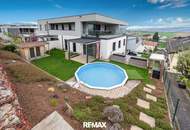 Barrierefreie Gartenwohnung mit DAN-Küche, Terrasse, Pool und zwei Parkplätzen in sonniger Ruhelage!