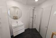 stylische 55m² Dachgeschosswohnung | 2 Zimmer | 23m² Terrasse mit Süd-West Blick | Klimaanlage & Außenjalousien