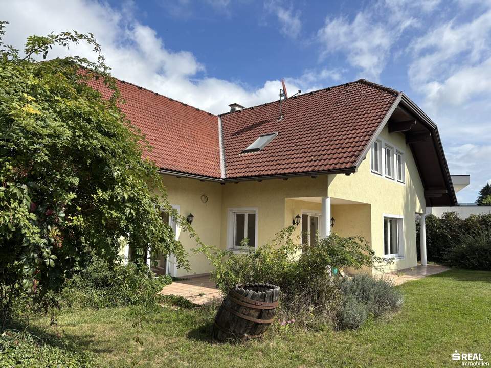 Vielseitiges Ein-/Zweifamilienhaus in Ebenthal - mit großzügigen Garten, sonniger Terrasse und eigener Garage!