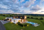 Architektenhaus in sonniger Ruhelage mit Spiral-Weinkeller, Infinity Pool, Burgblick und ca. 1 ha Eigengrund