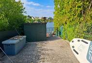 Uferparzelle am Steinbrunner See mit entzückendem Ferienhaus