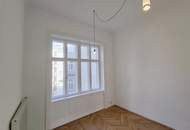 Stuck, Kachelofen, Flügeltüren: Altbauliebe mit Klopfbalkon