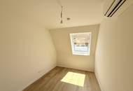 Eleganz trifft Lage – Neubau-Dachgeschosswohnung in Toplage