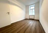 Elegante 3-Zimmerwohnung mit Balkon in saniertem Altbau