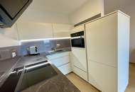 Neuwertige, südseitig ausgerichtete 2-Zimmer-Wohnung mit offen gestaltetem Koch-/Wohn-/Essbereich!