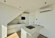 Dachgeschoss-Maisonette mit großer Dachterrasse und moderner Wohnküche