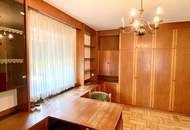 Zentral gelegenes Ein- bis Zweifamilienhaus mit großem Garten und Doppelgarage!