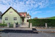 Vielseitiges Mehrfamilienhaus mit Charme und einladendem Garten